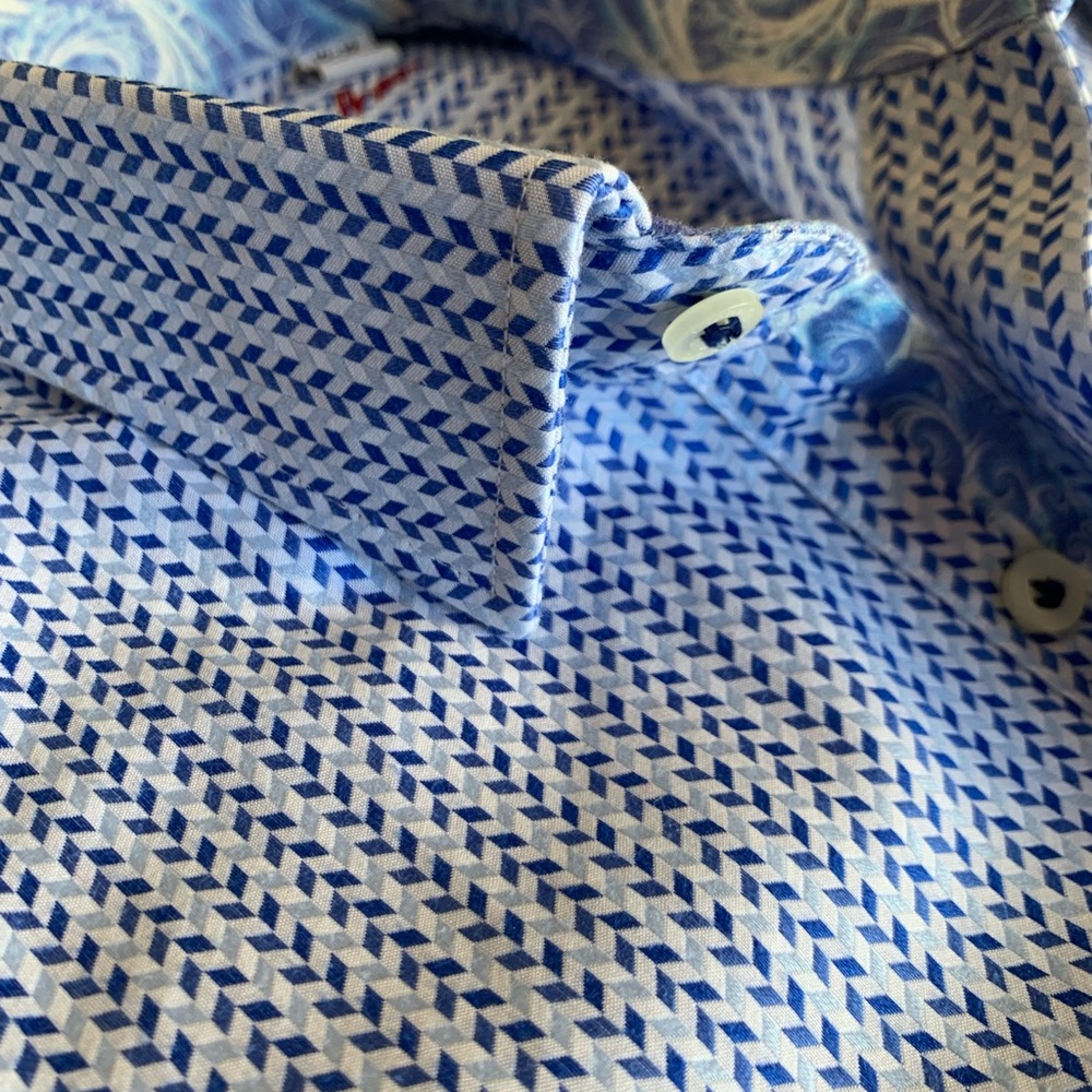 Kids shirt button down size 10-12 is a Medium
